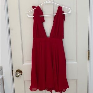 Beautiful red, bow sleeved mini dress!